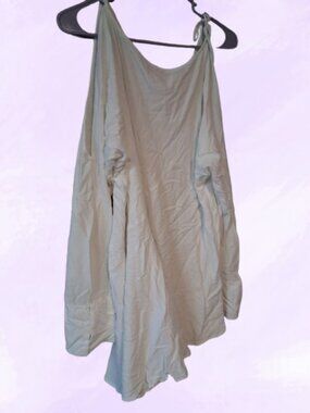 Free People cold shoulder oversized top slit on bottoms sleeves in white size M